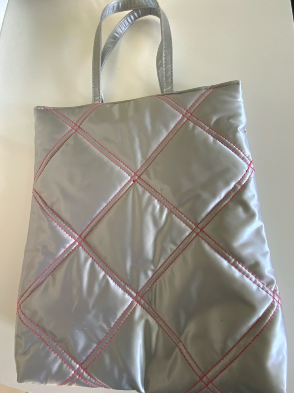 Clinique Silver Metallic Quilted Tote bag.